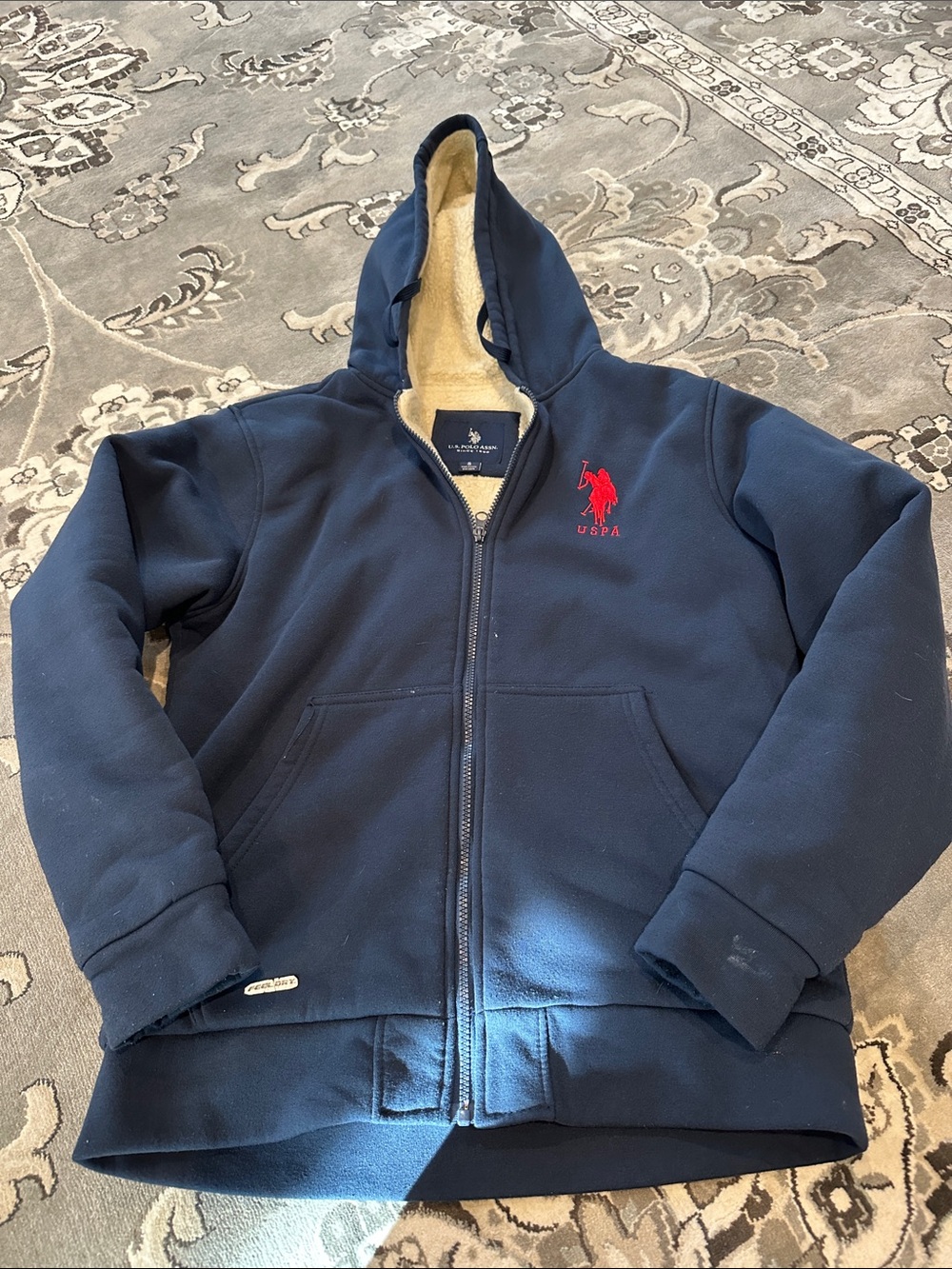 Men’s size small U.S. Polo Assn. Navy Hooded Sherpa Jacket with Red Logo